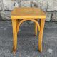 Curved wood stool in Baumann style