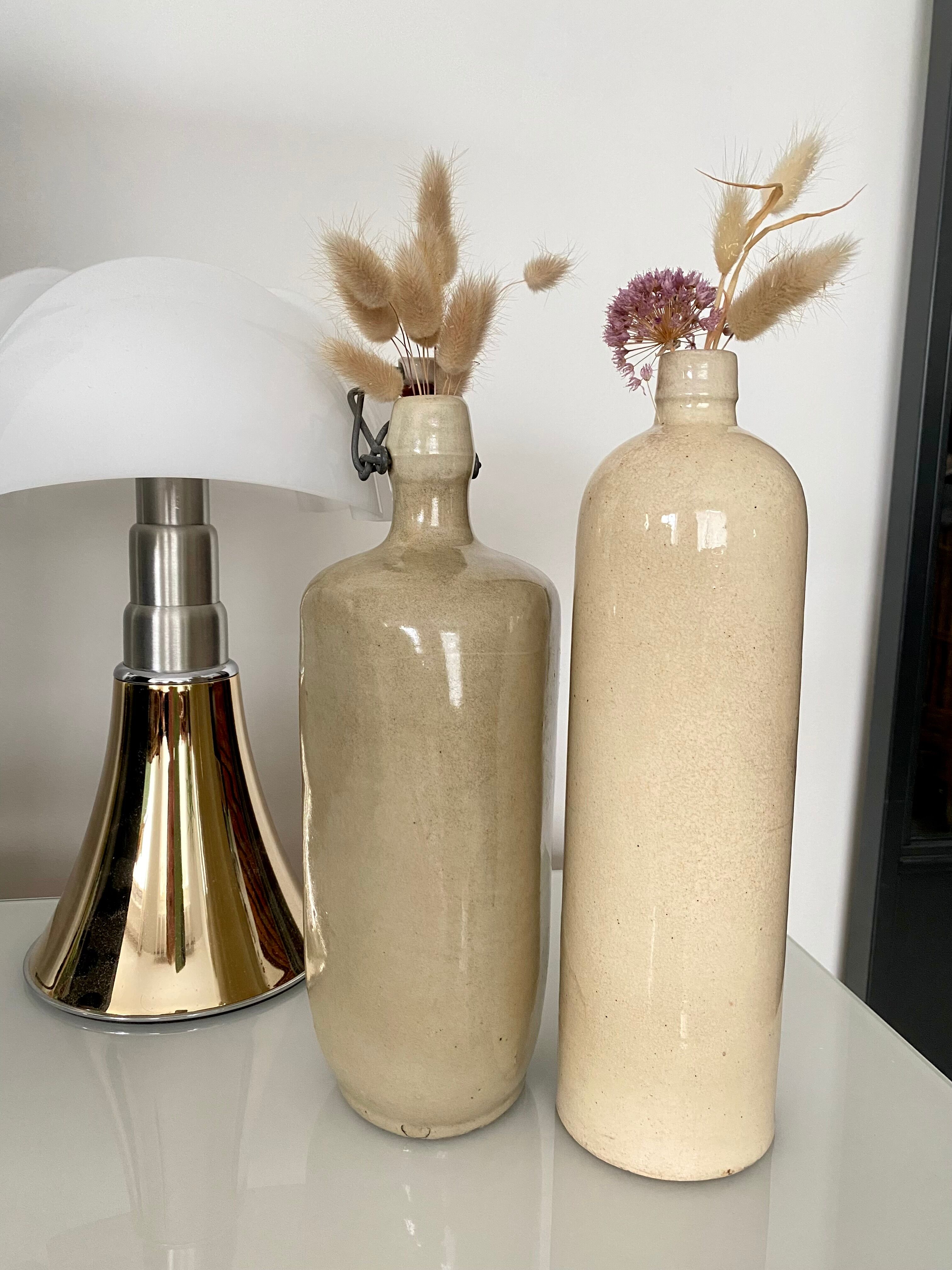 Set of 2 enamelled sandstone bottles