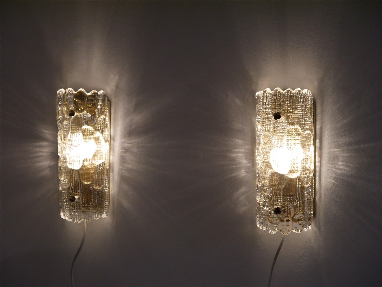 Pair of crystal and brass wall lamps by Carl Fagerlund for Orrefors