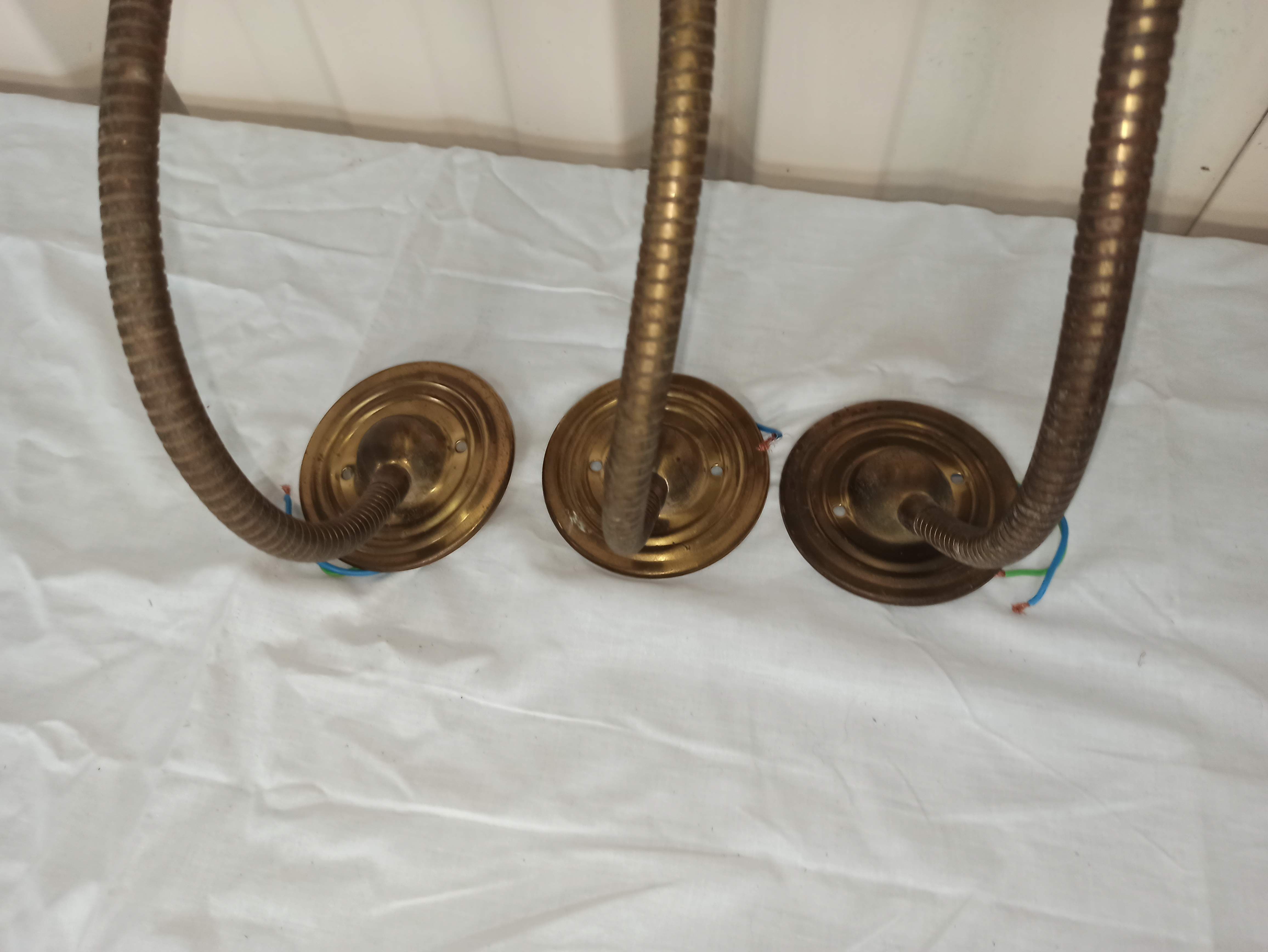Trio of wall lamps Christopher Wray applies articulated lamp shell