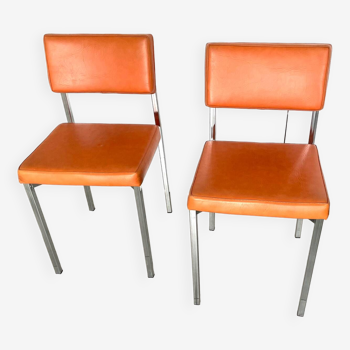 Pair of vintage Italian Skaï orange and chrome chairs 1970