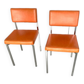 Pair of vintage Italian Skaï orange and chrome chairs 1970