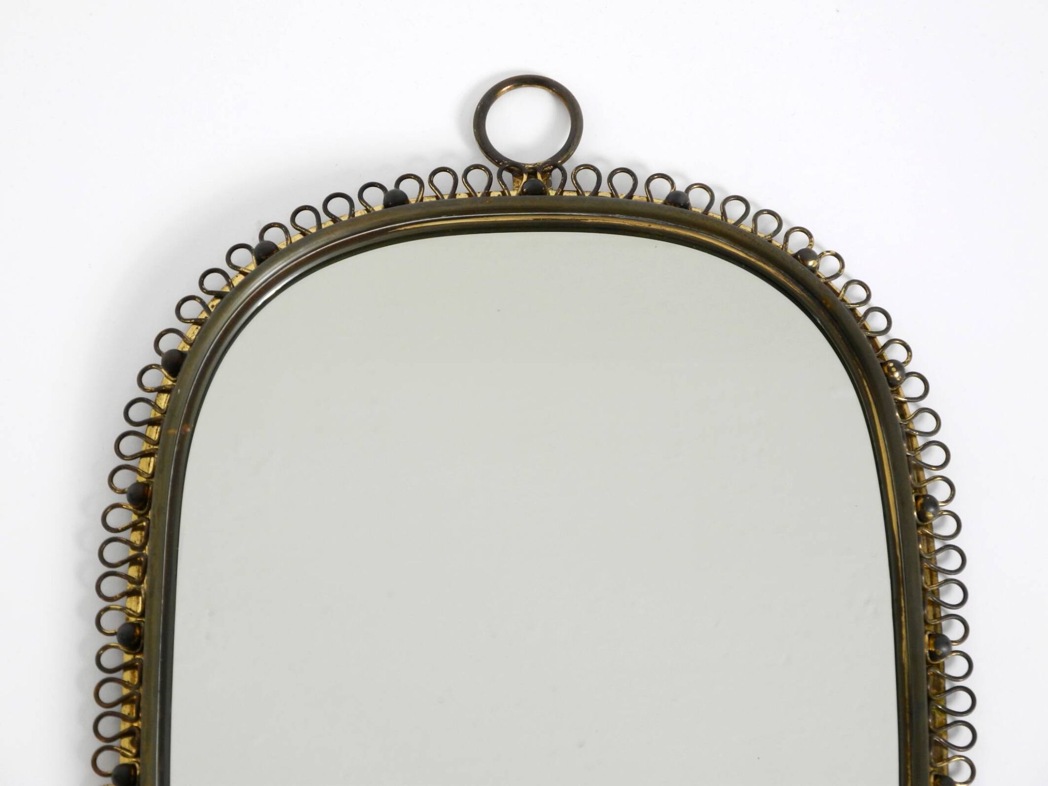 Mid century brass wall mirror by Josef Frank for Svenskt Tenn Sweden