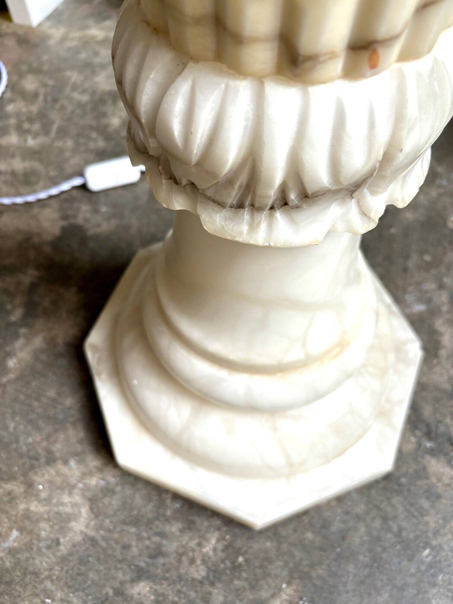 Column, illuminated alabaster saddle