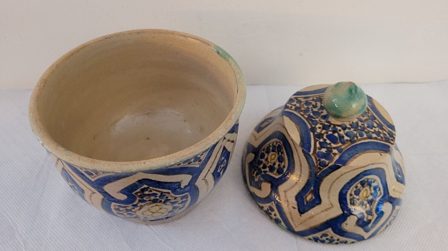 Pot in painted earth