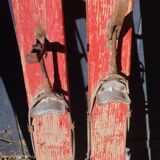 3 pairs of old skis