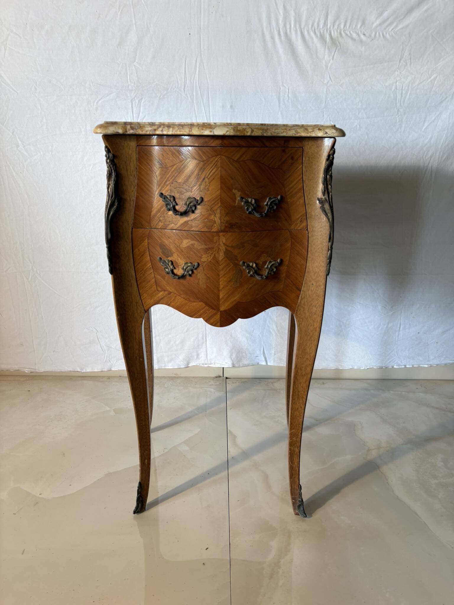 Small curved Louis XV style piece of furniture – marquetry and marble top