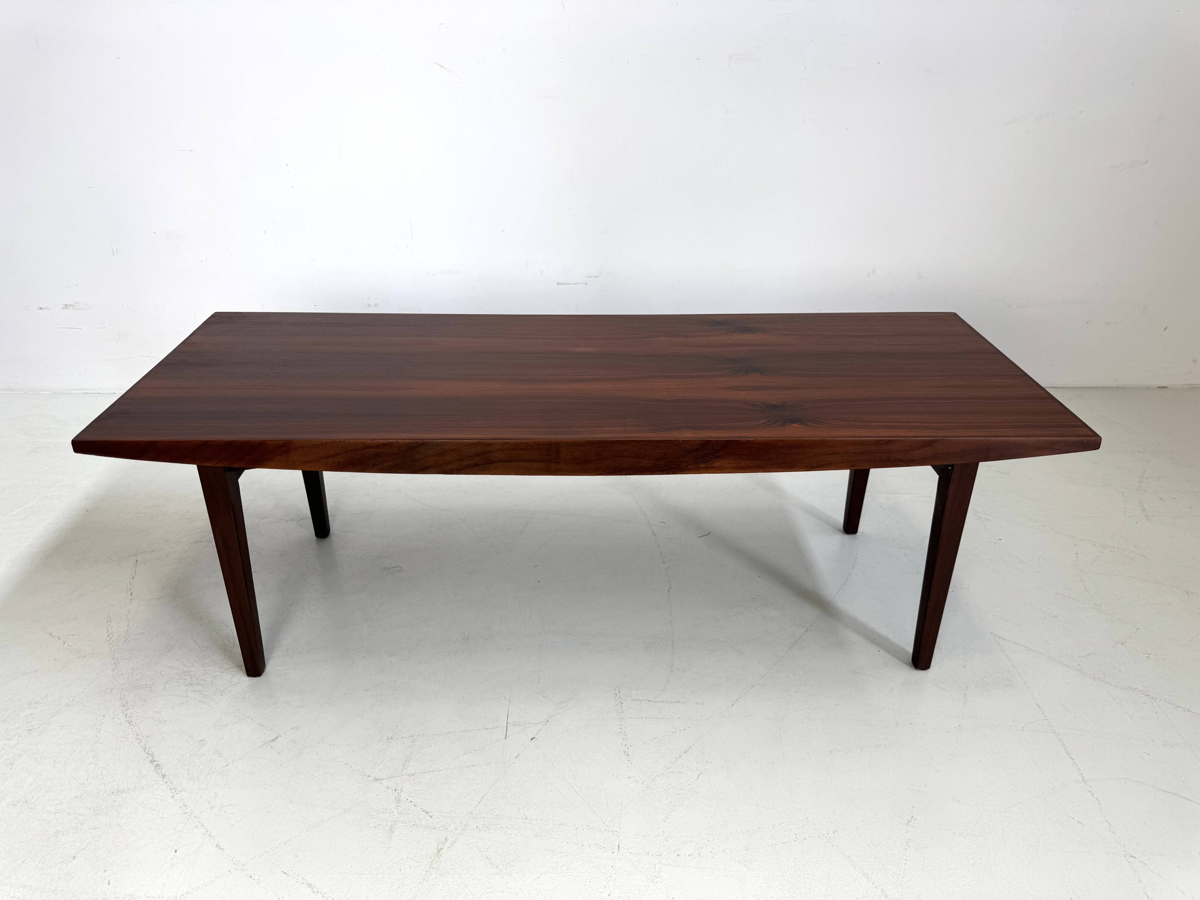 Beautiful compact design coffee table made of rosewood from the 1960s.
