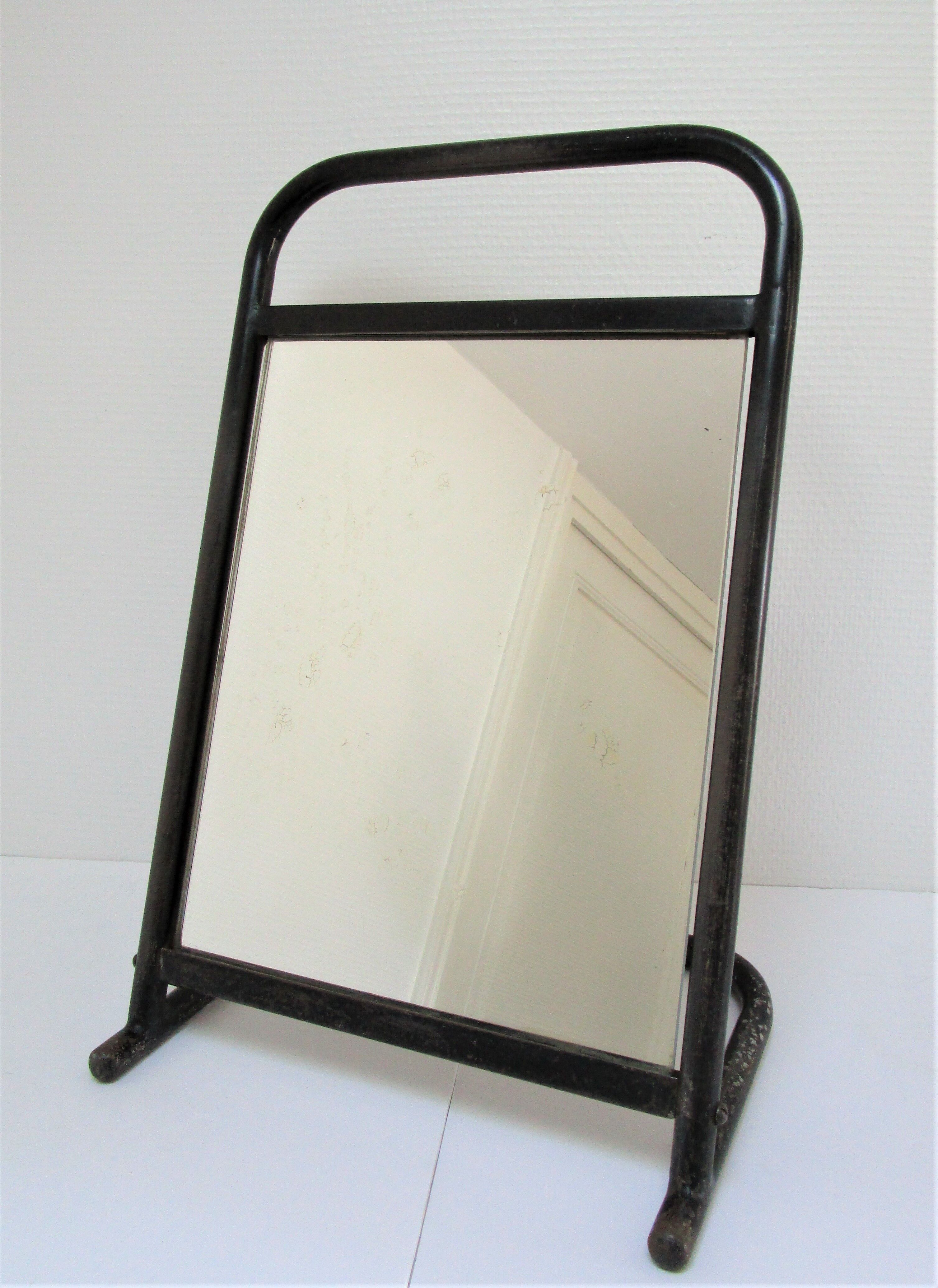 Vintage patinated metal shoe mirror