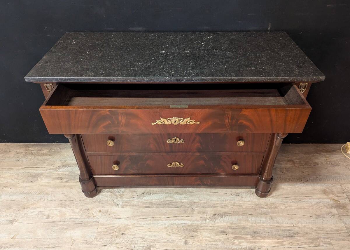 Mahogany chest of drawers with swan decoration