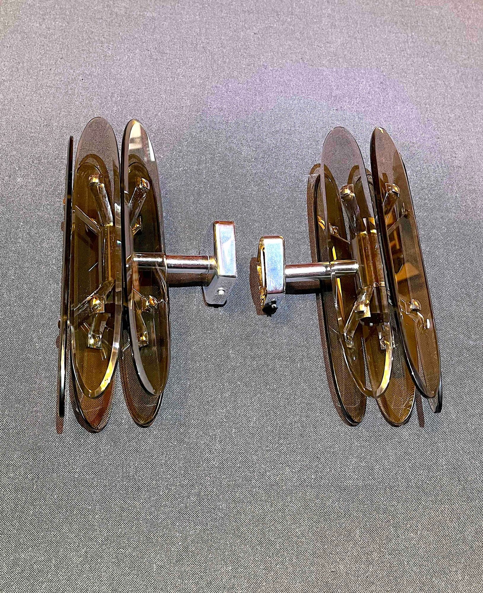 Pair of Italian wall lamp in glass and chrome, 1970's