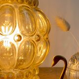 Vintage amber glass globe walker