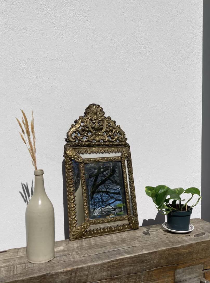 Golden mirror with 19th century embossed brass beads