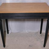 Console noire et bois brut