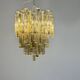 Venetian chandelier in colourless and gold Murano glass, Venini Triedi model, circa 1960.