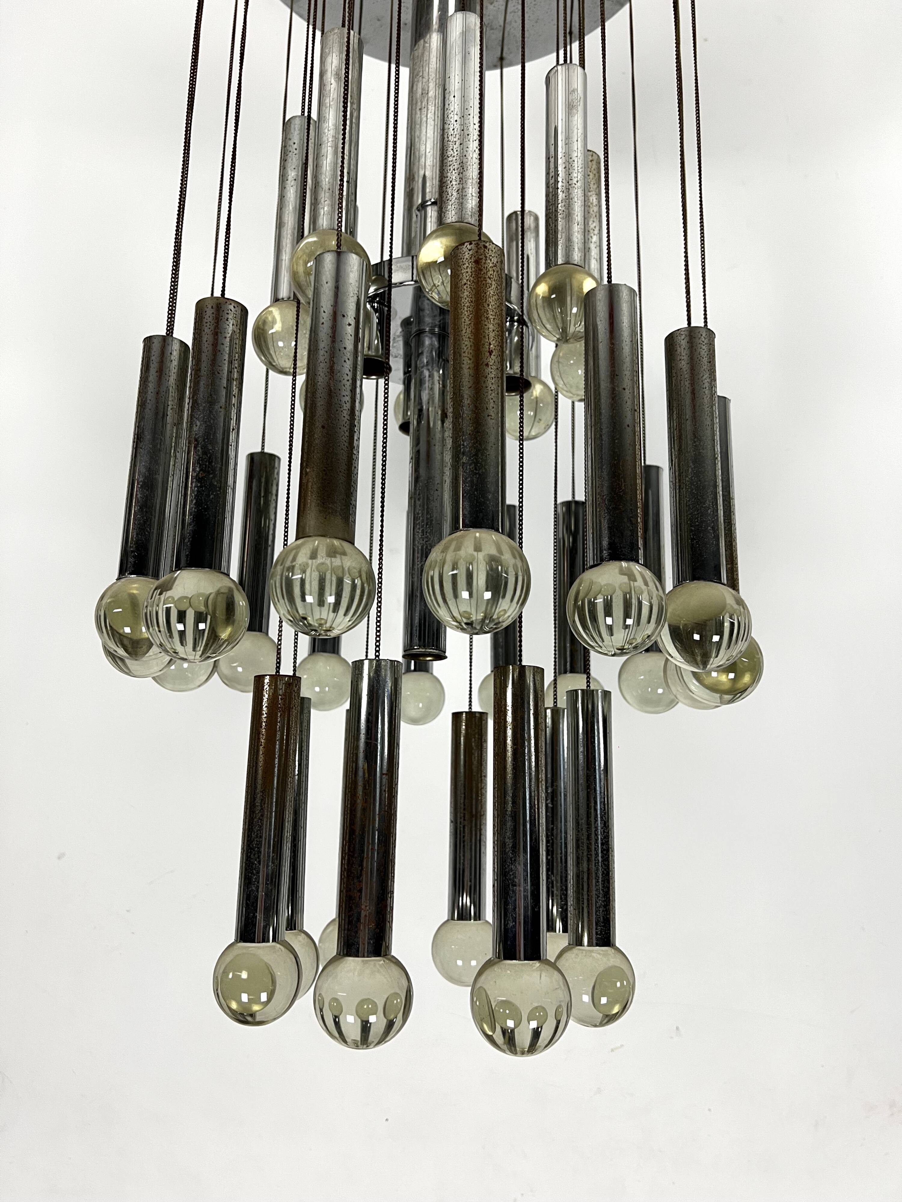 Mid- Century glass and chrome chandelier by Sciolari. Italy 1960s