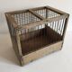 Old bird cage in wood and steel