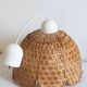 Vintage flower suspension in wicker rattan