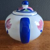 Antique teapot with flower pattern