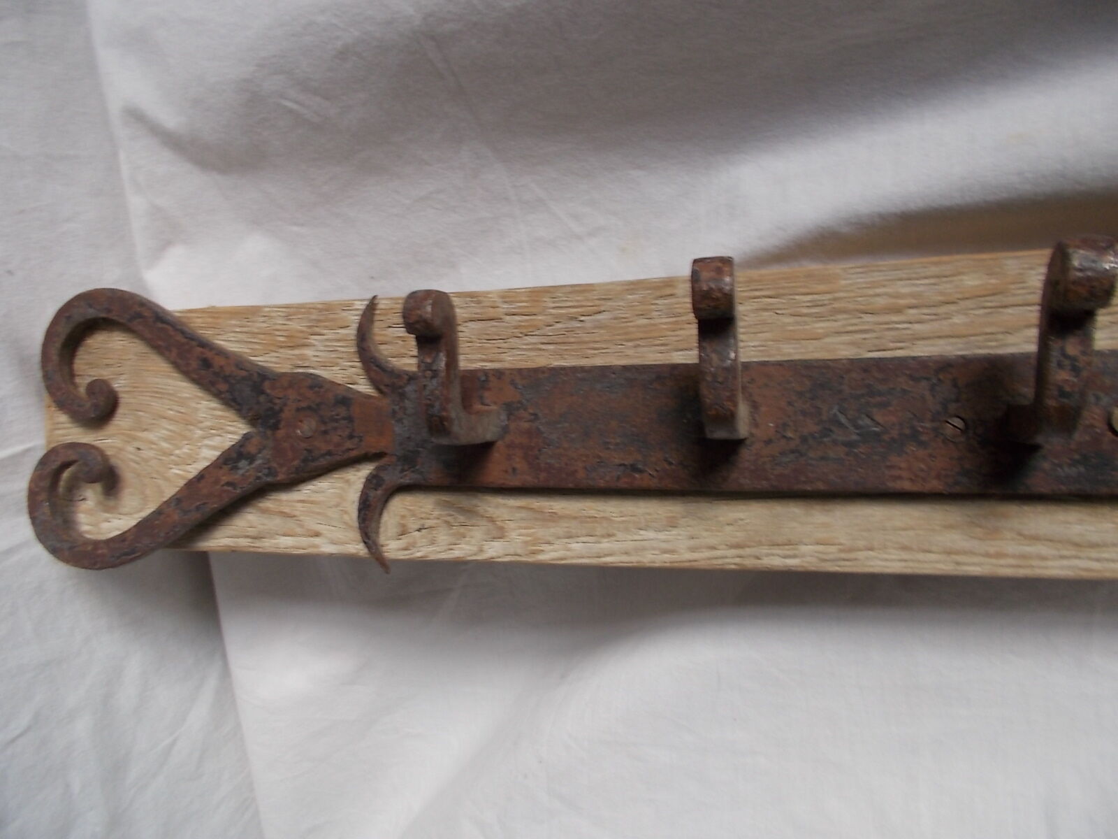 Wrought iron and wooden rack