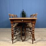 Antique cherry wood dining table from France.