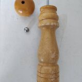 Turned wooden pepper mill