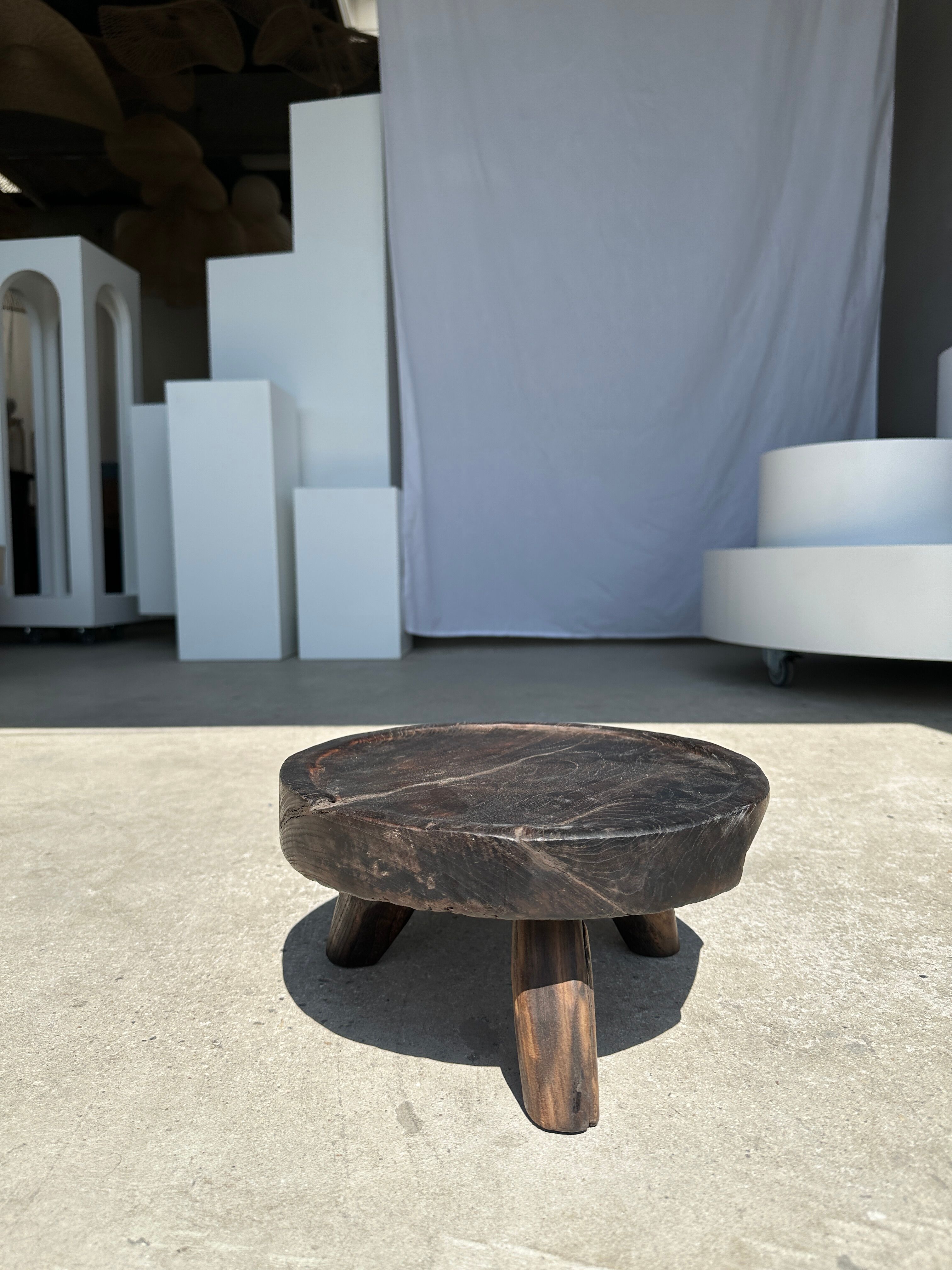 Small tripod stool low in dark brown upcycled teak