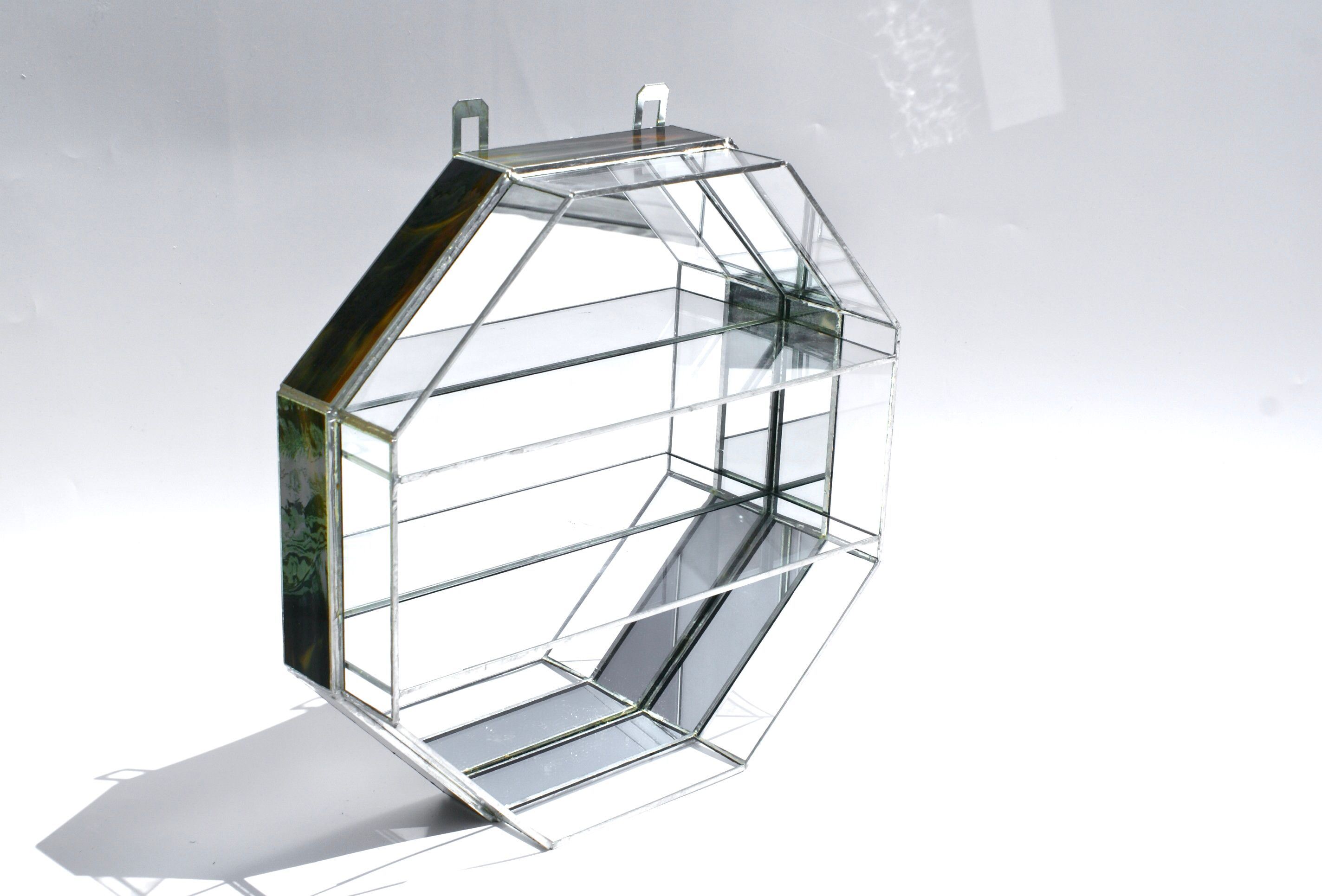 Handcrafted mirrored shelving cabinet