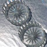 A pair of vintage cut glass catchalls.