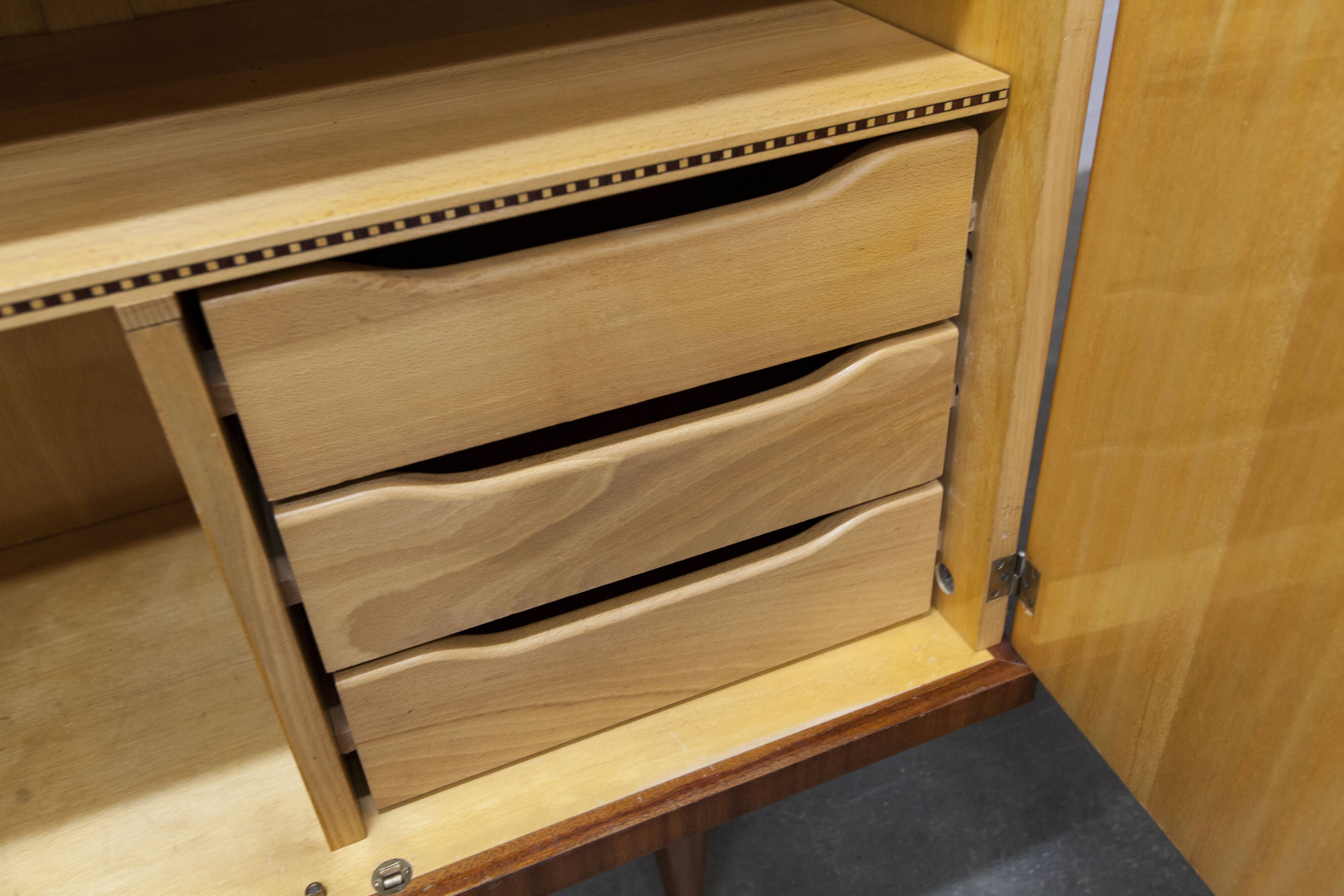 1960s Scandinavian wardrobe, blonde varnished wood, unusual, 4 doors, 3 drawers, 7 shelves.