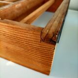 Wooden shelf with unroller wipes everything