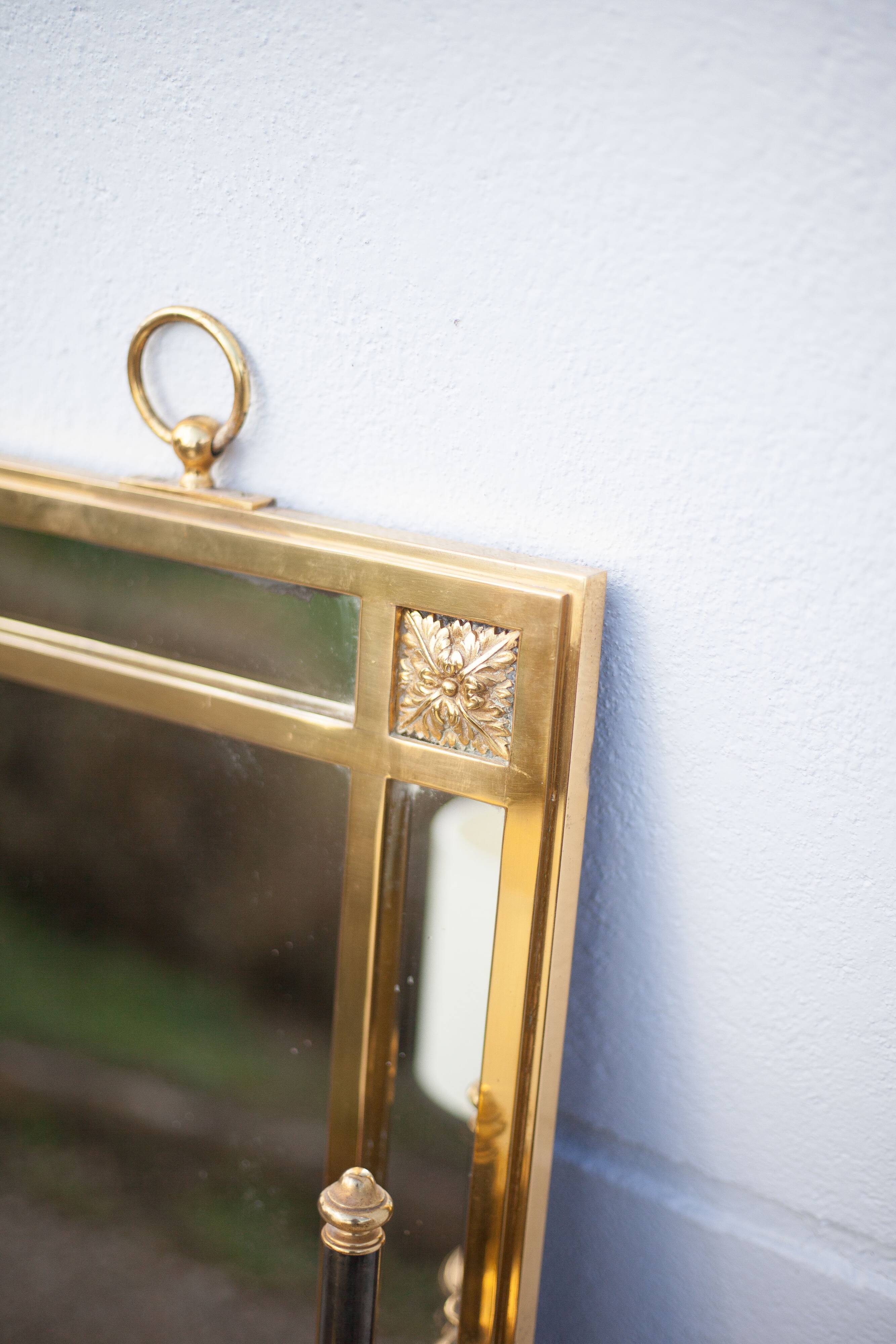 mirror with articulated wall light