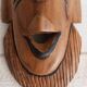 African mask in light wood