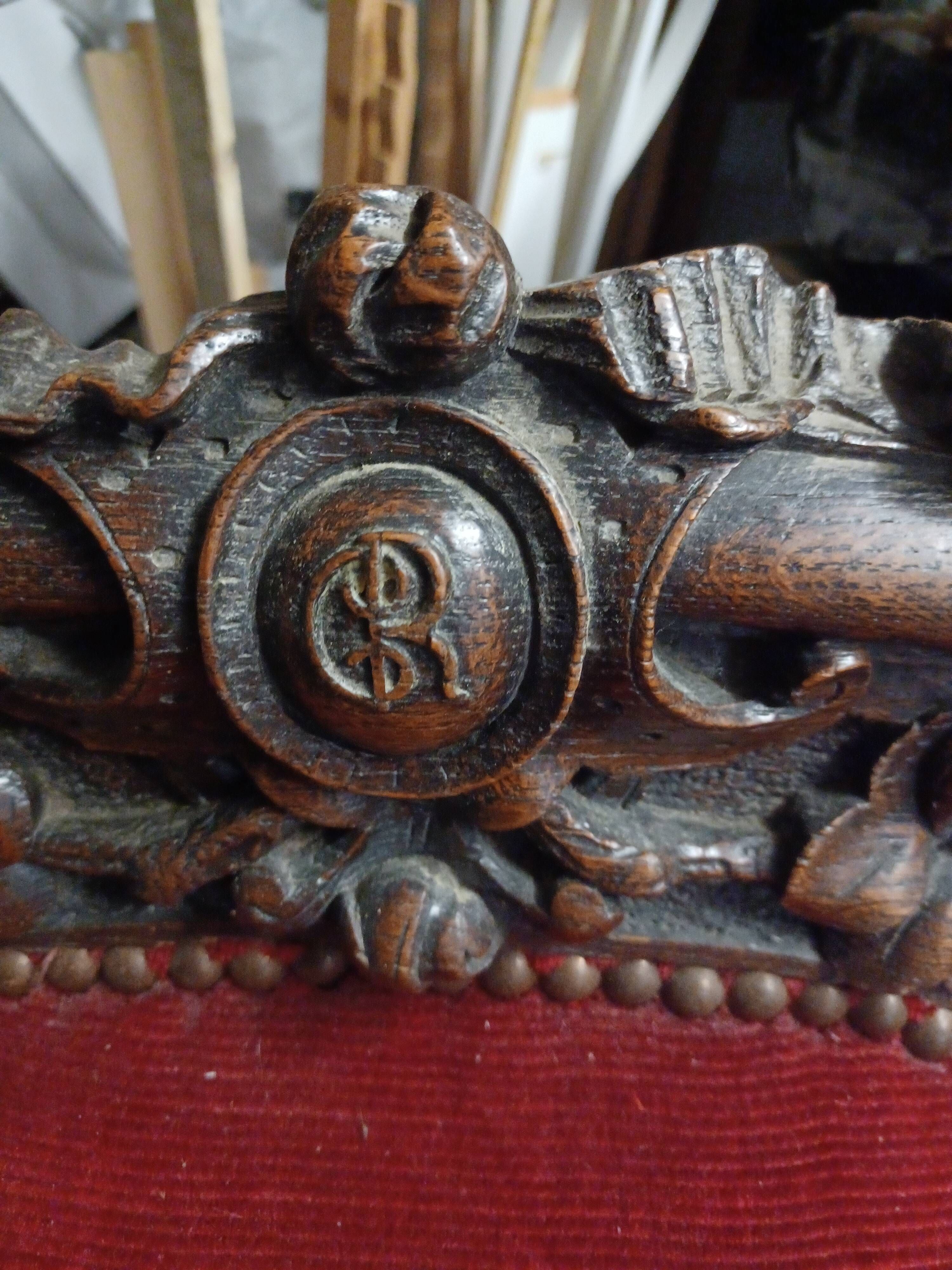 Baroque style chair in monogrammed wood and red velvet fabric