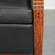 Electrically adjustable Art Deco design recliner with black cowhide leather