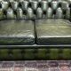 Chesterfield 2-seater green leather sofa from the 1980s