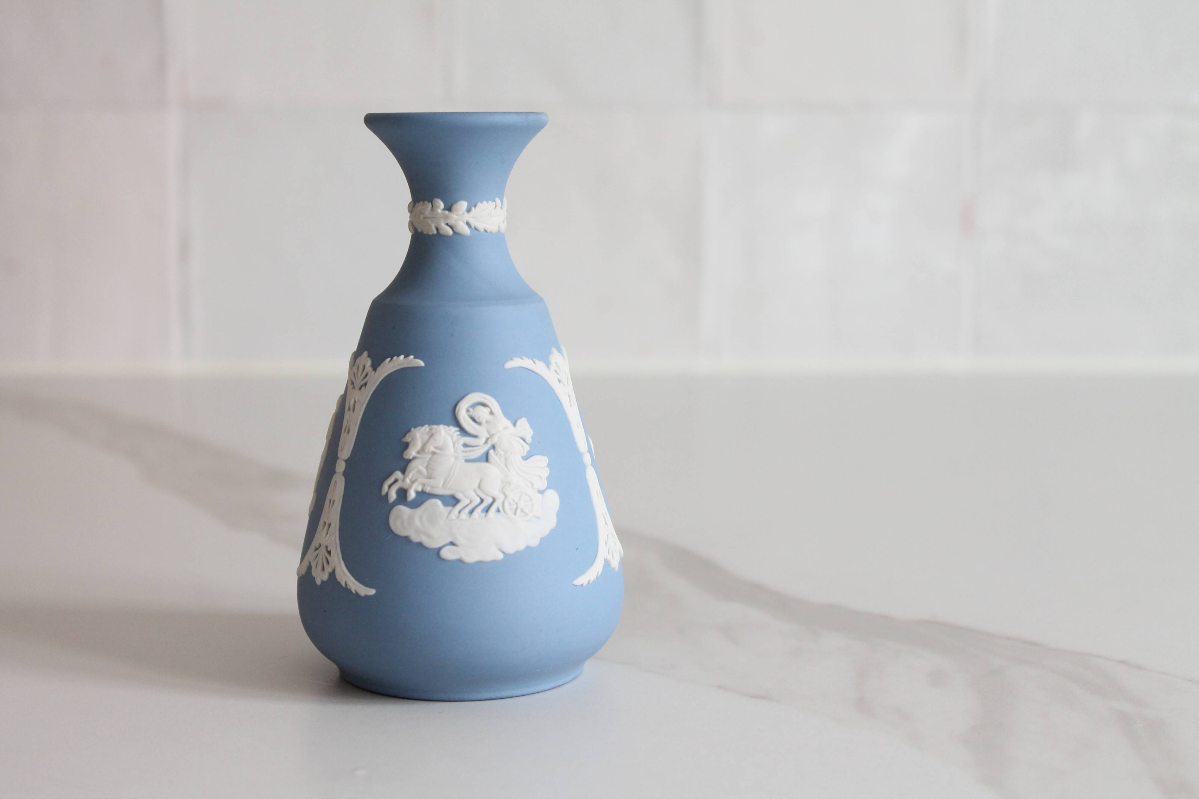 Blue porcelain vase by Wedgwood.