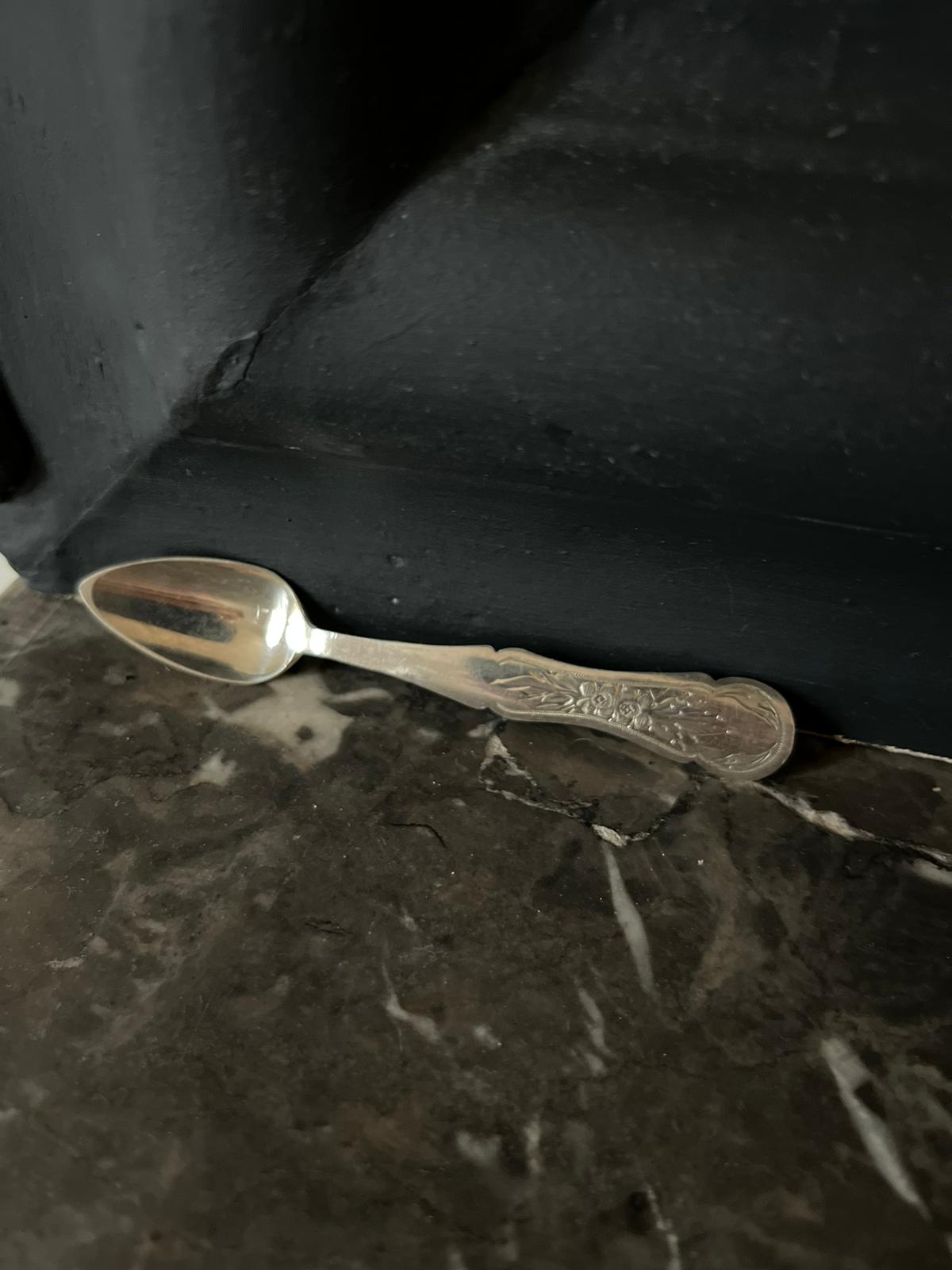 12 silver mocha spoons with flower decoration dating from 1916