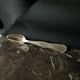 12 silver mocha spoons with flower decoration dating from 1916