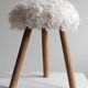 Danish mid-century tripod stool in beech, reupholstered in lambswool, 1960s.