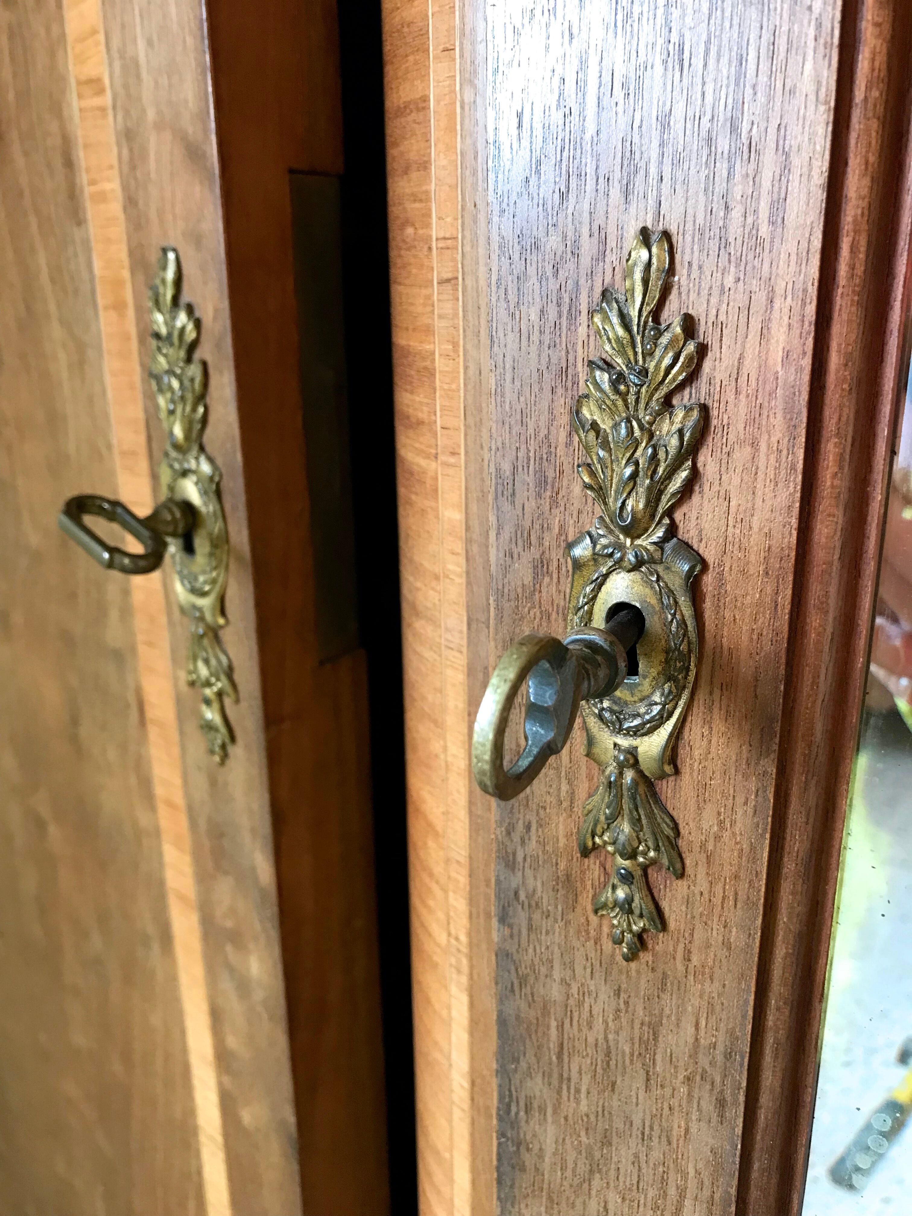 Art deco inlaid and bronze 3-door wardrobe circa 1920