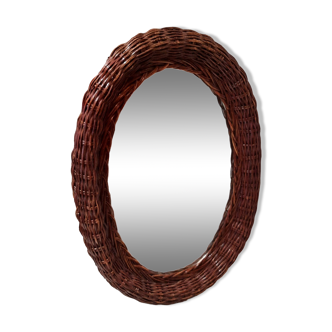 Vintage woven wicker oval mirror