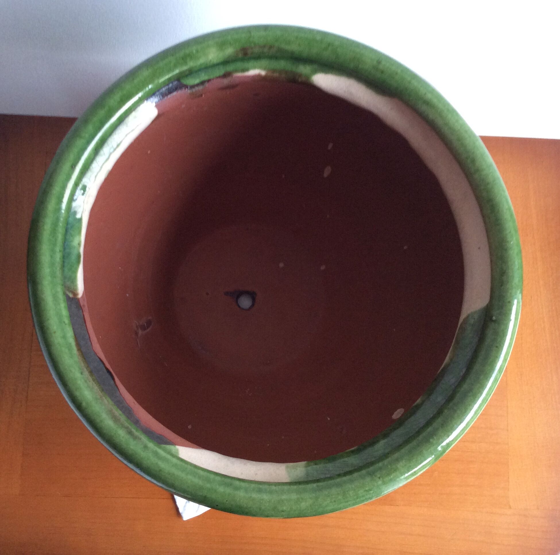 Old terracotta pot enamelled ball shape