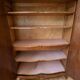 Antique Louis XV wardrobe in wood with chevron pattern.