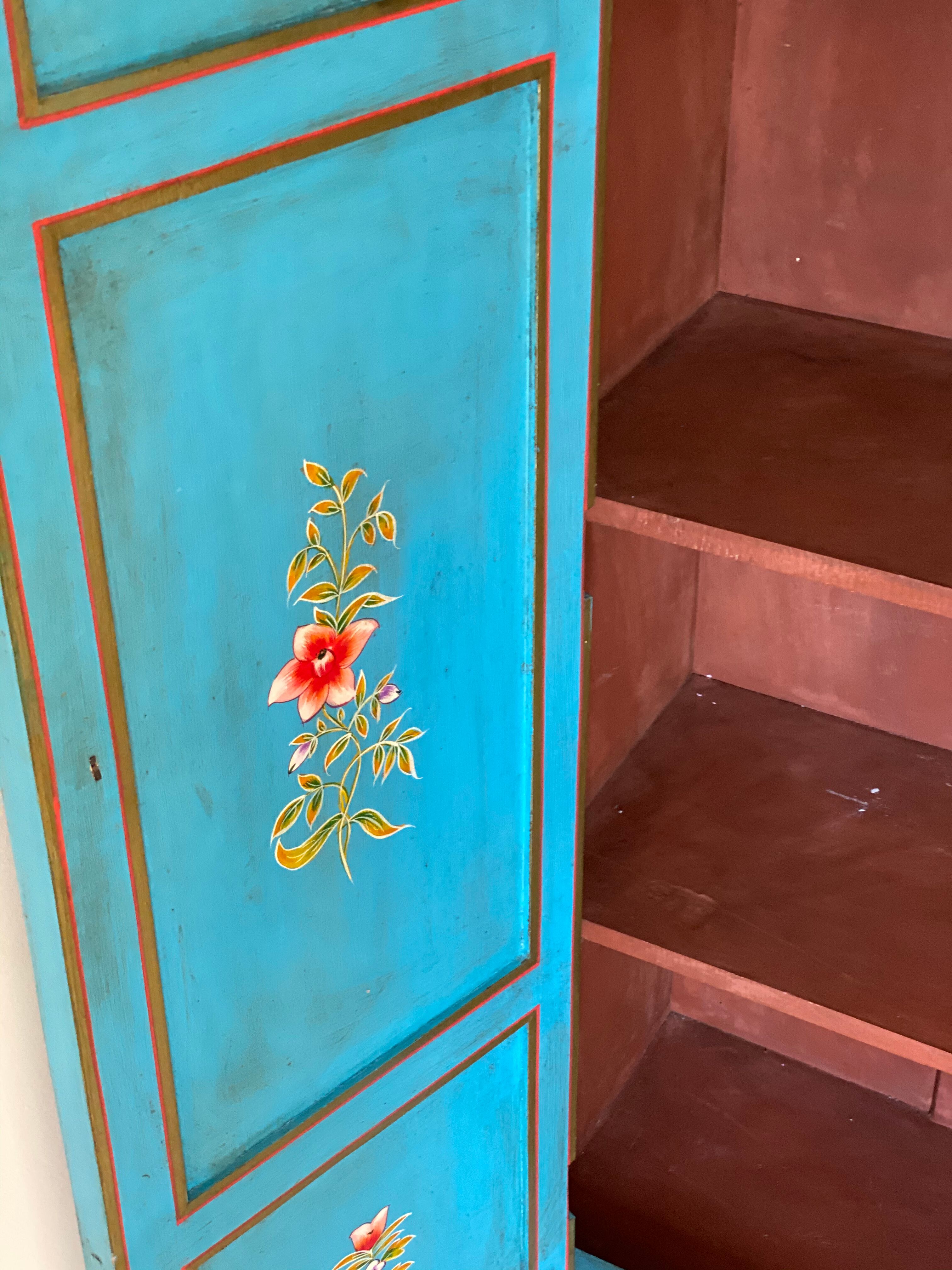 Painted cabinet with floral decoration