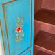 Painted cabinet with floral decoration