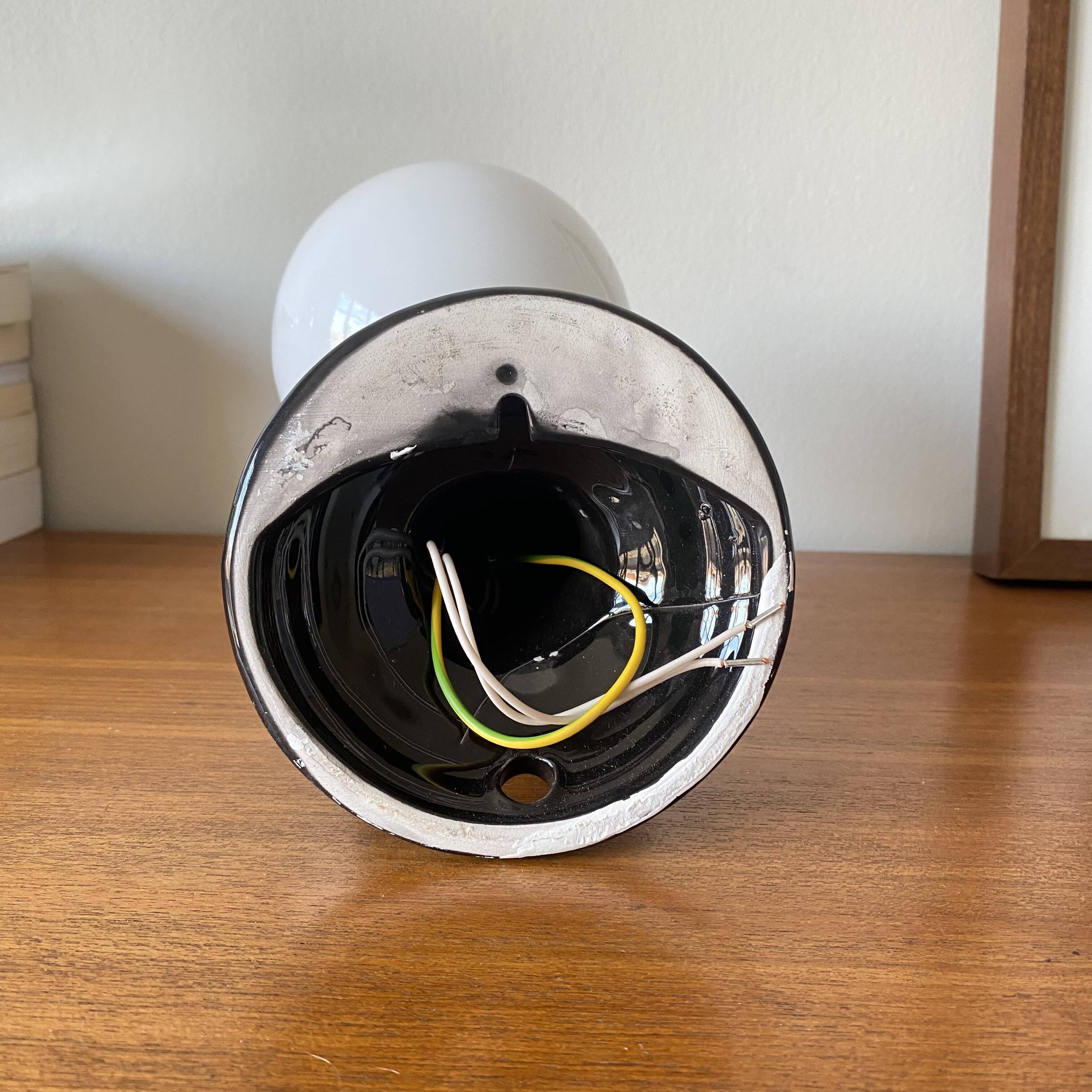 Pair of black ceramic wall lights from the 70s and 80s.