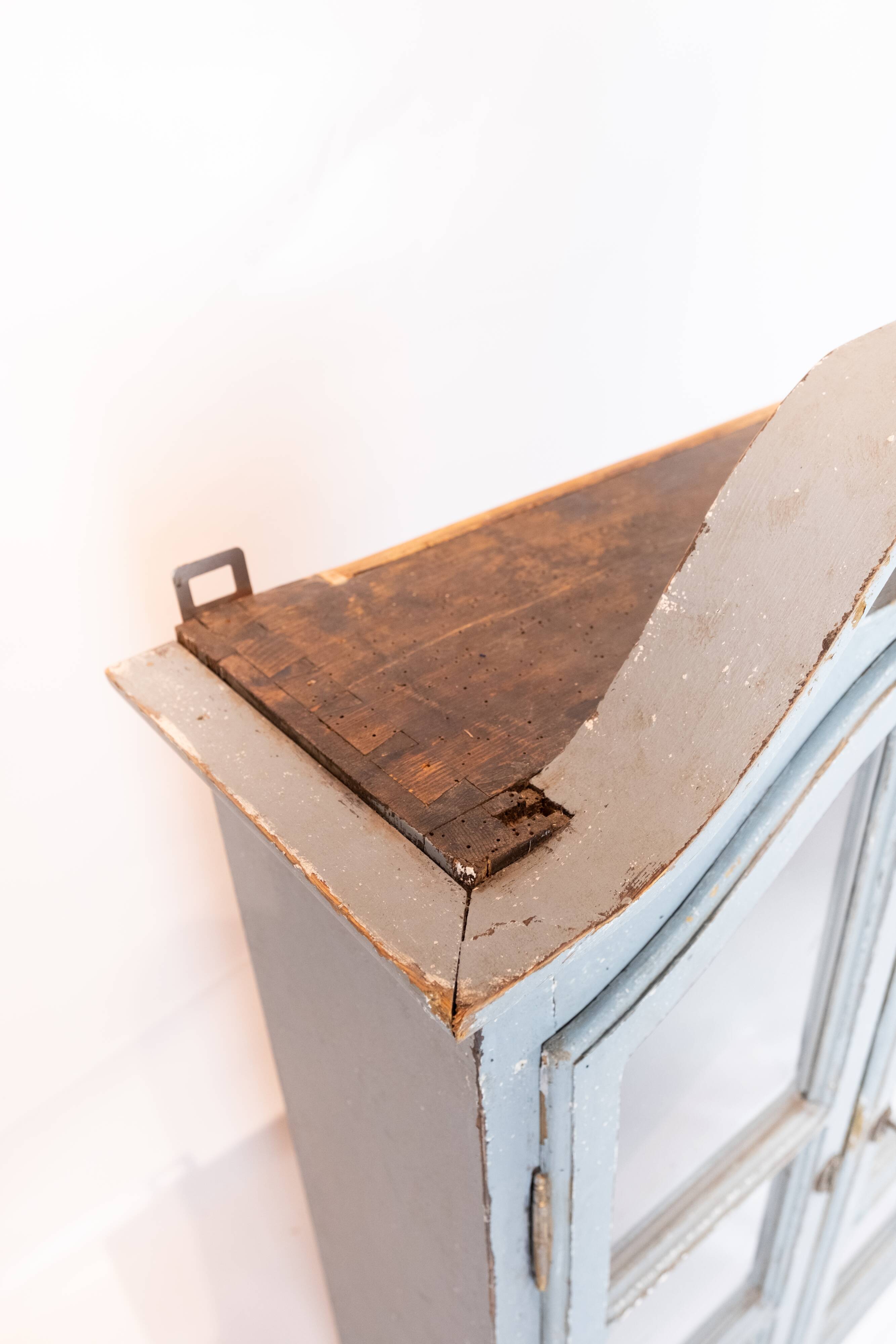 Grey painted hanging glass cabinet in gustavian style from around 1820.