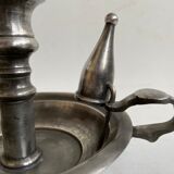 Tin candlestick with extinguisher