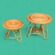 Pair of tripod coffee tables in rattan from the 1950s.
